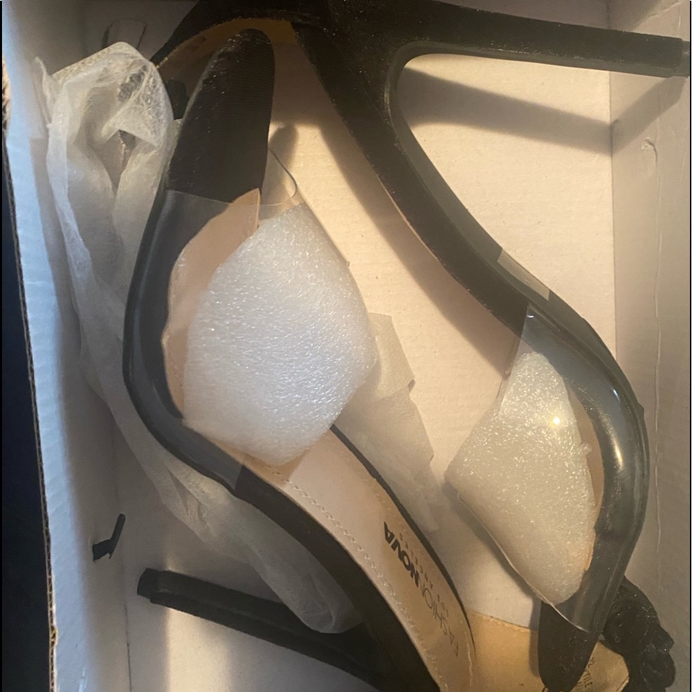 Clear/ black high heels